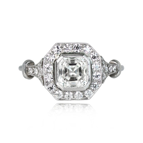 Top-down view displaying a 2 CT Asscher cut lab diamond set in an octagonal milgrain halo with diamond-accented shoulders.
