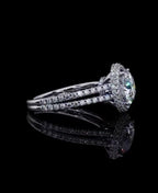Side view of 3 CT round cut lab grown diamond engagement ring with double pavé split shank and halo setting.