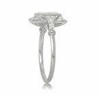 Side profile view of a 2 CT emerald cut lab grown diamond halo ring with pave-set diamond shoulders and milgrain detailing.