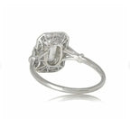 Perspective bottom view of an Art Deco emerald cut lab diamond ring showcasing intricate gallery lattice work.