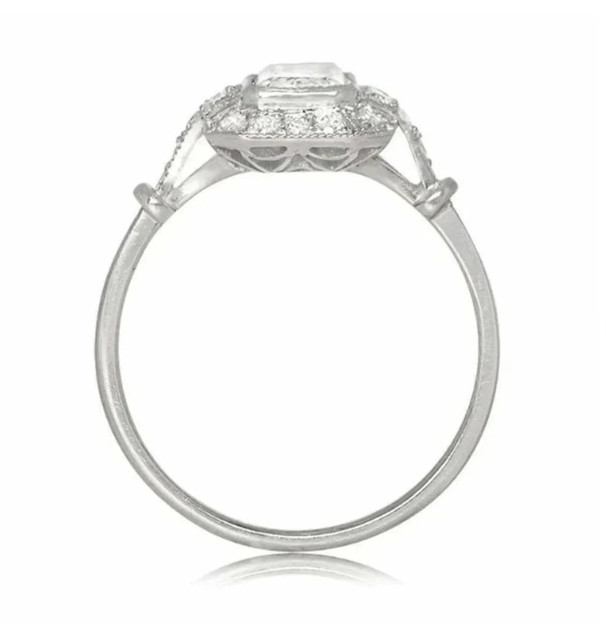 Direct side view highlighting the setting height and slender band profile of a 2 CT vintage emerald cut diamond ring.
