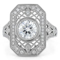Top-down view of a 2 CT round lab grown diamond Art Deco shield ring with geometric lattice filigree and milgrain pave borders in white gold