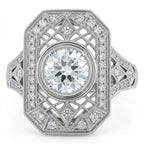 Top-down view of a 2 CT round lab grown diamond Art Deco shield ring with geometric lattice filigree and milgrain pave borders in white gold