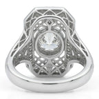 Bottom view of an Art Deco round diamond ring displaying the openwork undergallery lattice structure and platinum hallmark stamp.