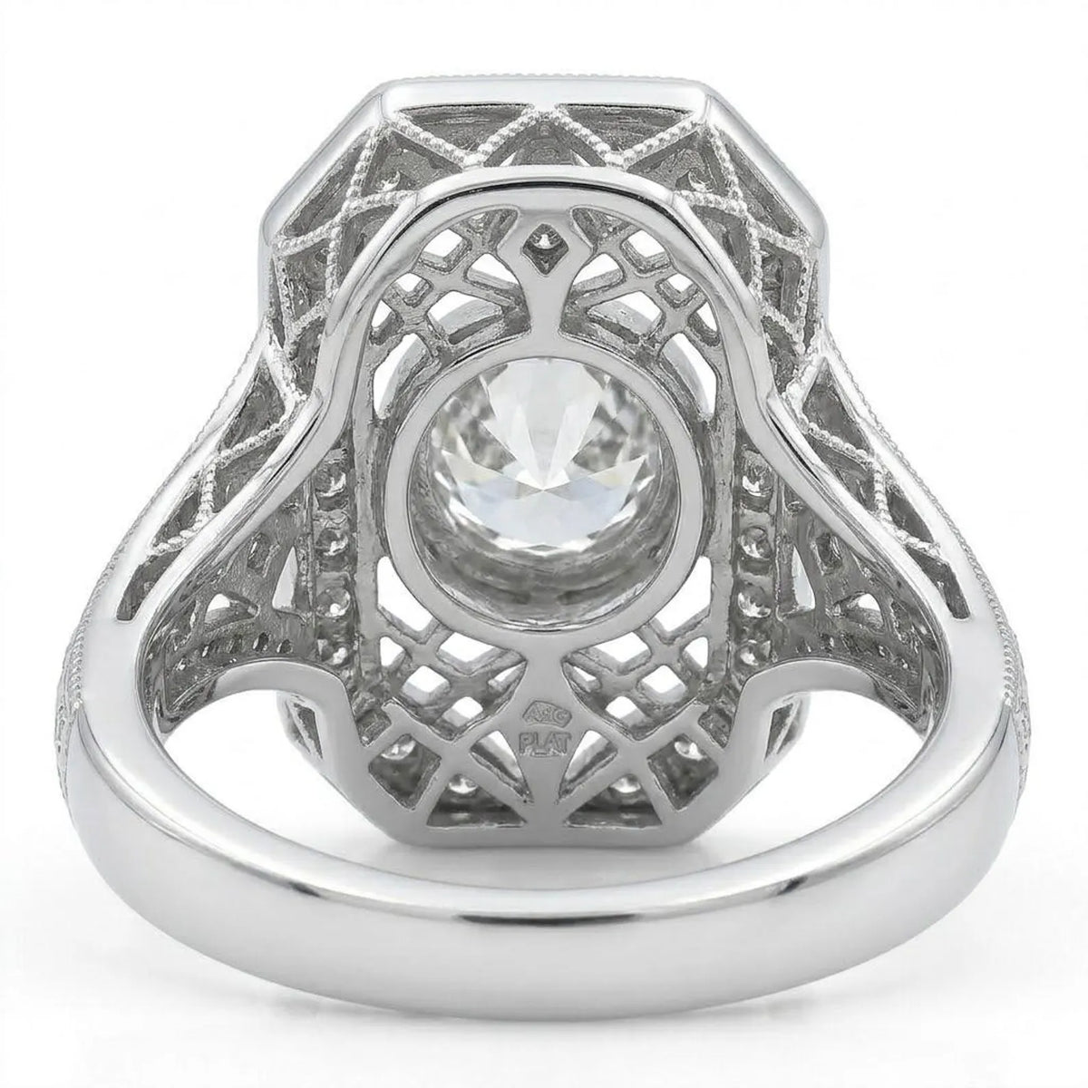 Bottom view of an Art Deco round diamond ring displaying the openwork undergallery lattice structure and platinum hallmark stamp.