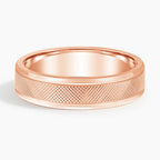 Front profile view of rose gold men's wedding ring with intricate diamond-cut textured inlay