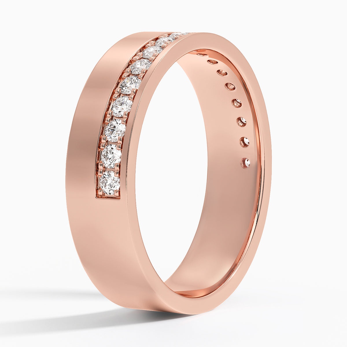 Angled view of rose gold men's wedding band with an off-center pave-set diamond stripe.