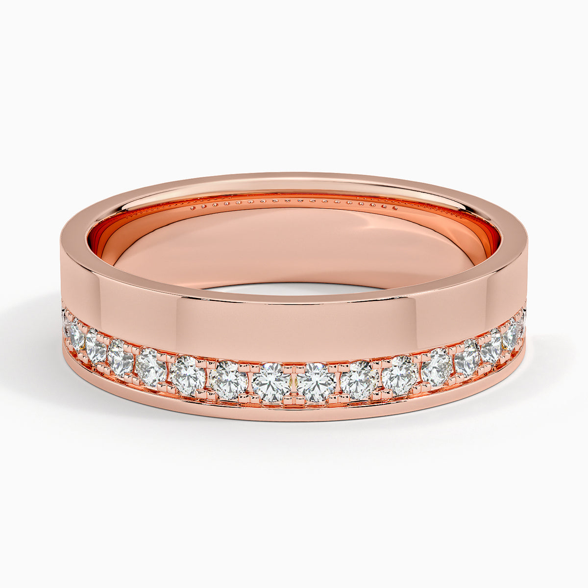 Front profile of rose gold men's wedding ring with an asymmetric line of sparkling diamonds.