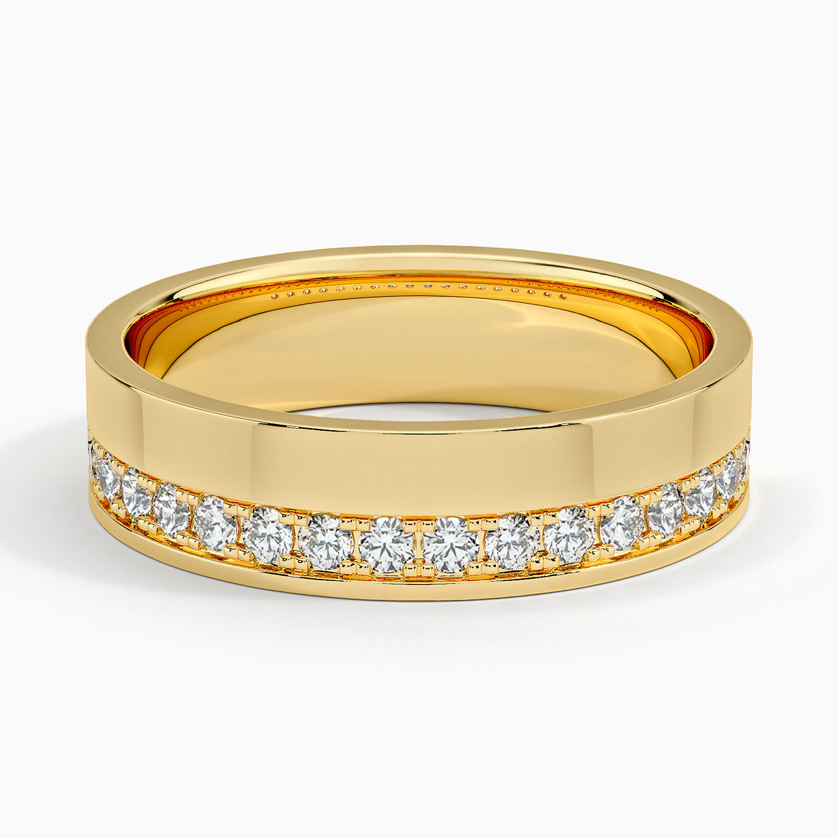 Front view of yellow gold men's wedding band featuring an off-center diamond accent channel.