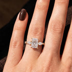 Direct on-hand perspective showcasing the sparkle of a 3 CT radiant lab diamond ring in warm light.