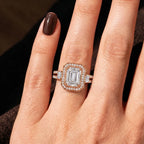 On-hand view of 3 CT emerald cut lab grown diamond halo engagement ring in rose gold.