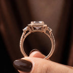 Direct side gallery view showing the setting and structure of rose gold emerald cut lab diamond ring.