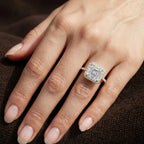 Direct overhead view of a woman wearing a 3 carat Asscher cut lab diamond pave halo ring.