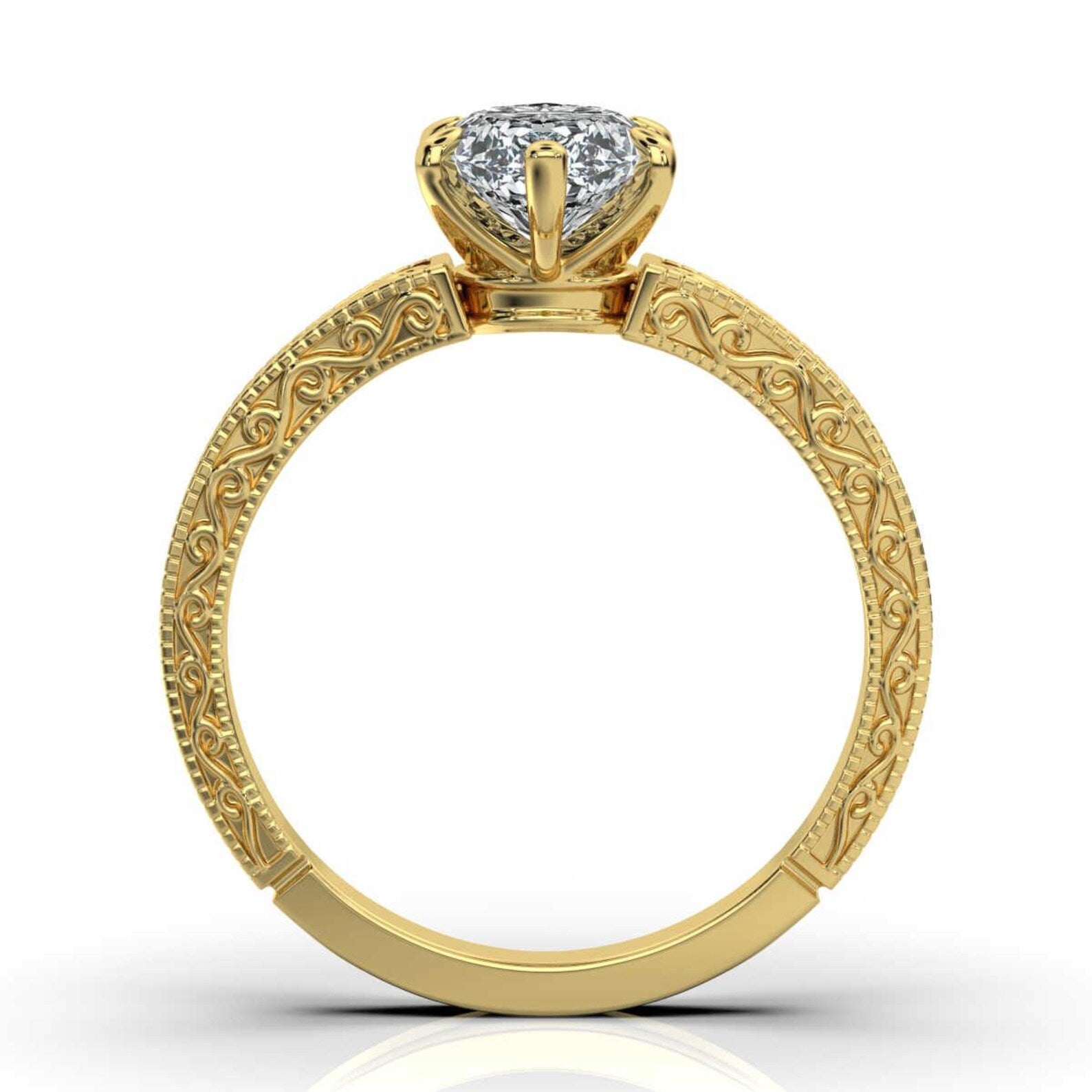 Direct side profile view showing the intricate carved band of a yellow gold 3ct marquise diamond ring.