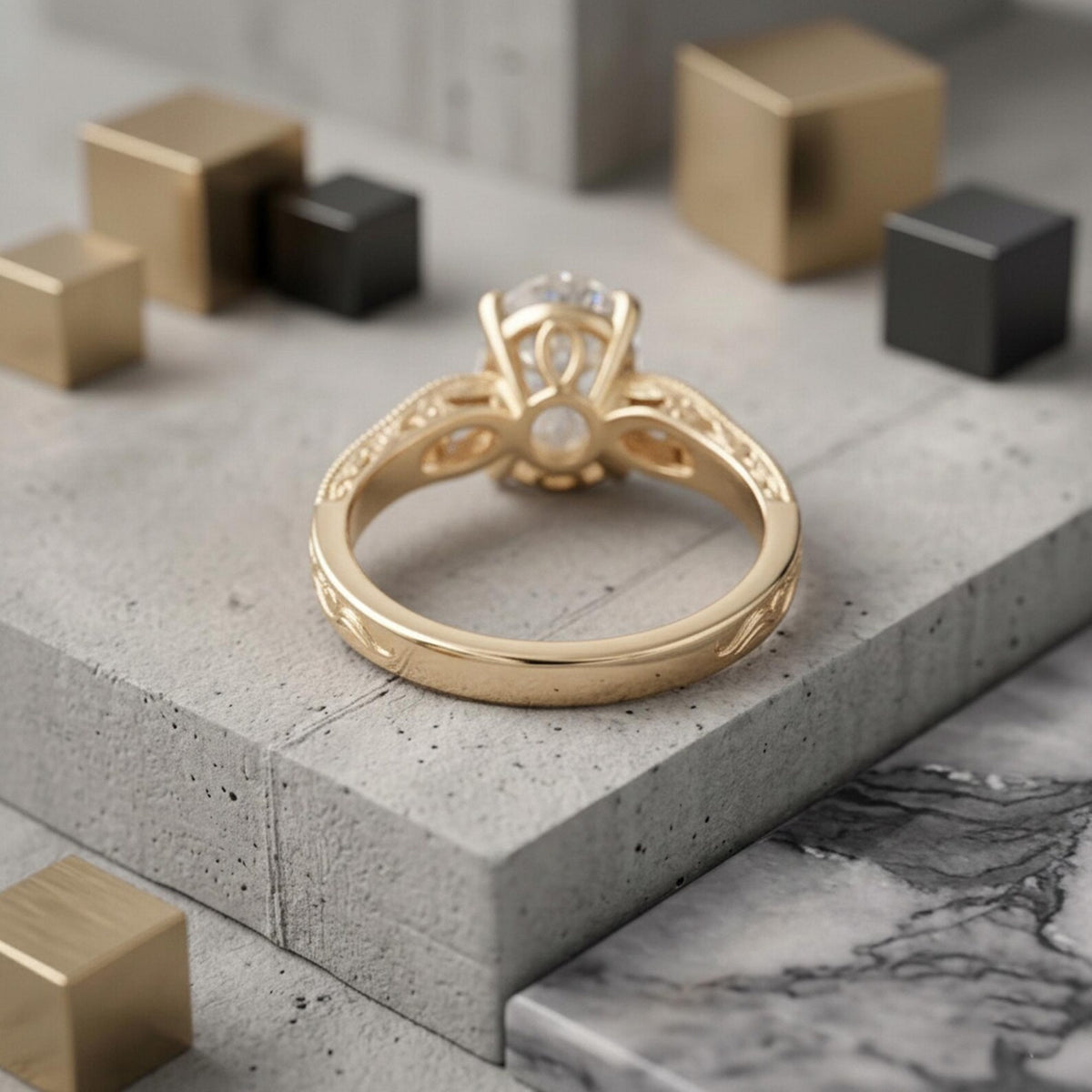 Rear basket view showing the under-gallery structure and 14K yellow gold band of a 2 carat oval diamond filigree ring.