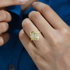 On-hand view of a 4 carat fancy yellow marquise cut lab grown diamond engagement ring set in 14K yellow gold.