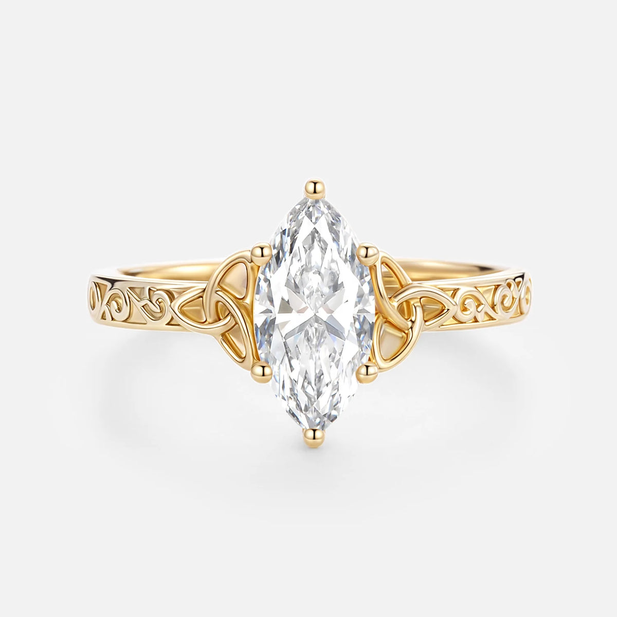 Top-down front view of a 2ct marquise lab created diamond set in a 14k yellow gold Trinity knot band.