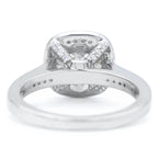 Underside gallery view of a cushion lab diamond engagement ring showing hidden pave accents on the basket struts.