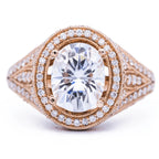 Top-down view of a 3 CT oval cut lab grown diamond engagement ring with milgrain pave halo in rose gold.