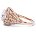 Side profile of a 3ct oval lab grown diamond engagement ring in rose gold showcasing the elevated halo and band.