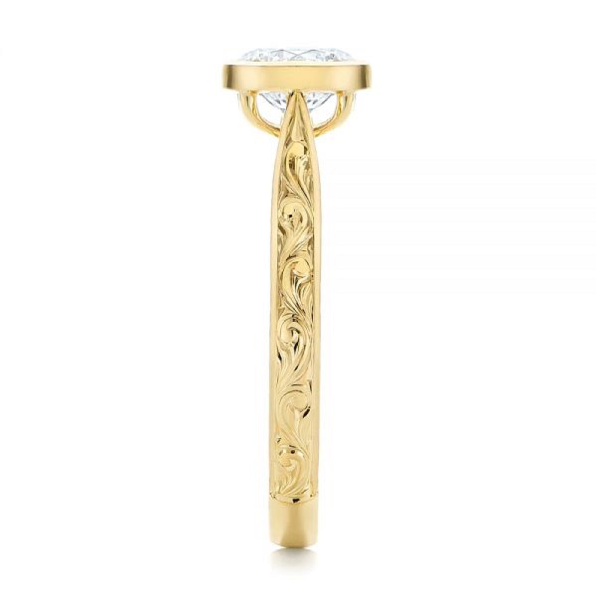 Close-up side profile showing detailed hand-carved floral scroll patterns on the yellow gold ring band.