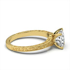 Side profile of 2 carat princess cut lab grown diamond solitaire ring in 14k yellow gold with detailed scrollwork.