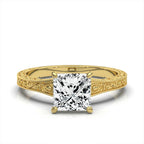 Front view of 2ct princess cut lab grown diamond solitaire engagement ring set in classic yellow gold