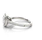 Side view of the white gold ring featuring cathedral arches and delicate milgrain pavé edging along the shank.