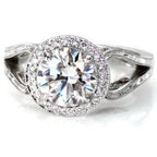 Direct overhead angle of a round cut lab-grown diamond set in an intricate Art Deco style halo setting.