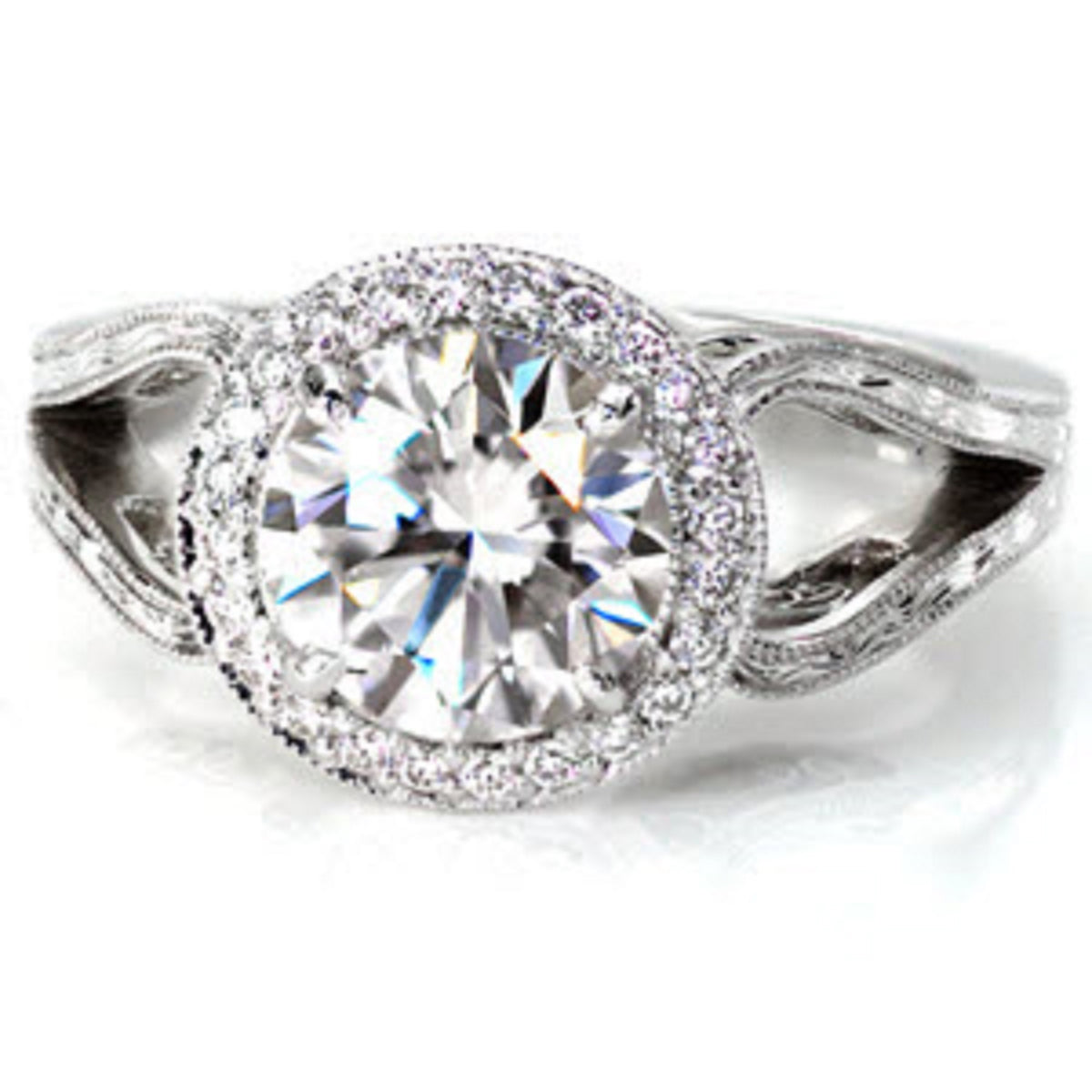 Direct overhead angle of a round cut lab-grown diamond set in an intricate Art Deco style halo setting.