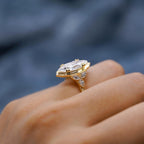 Hero studio view of 4 CT marquise cut lab grown diamond engagement ring with scalloped milgrain frame in yellow gold.