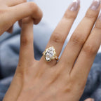 Full hand view displaying the statement 4 CT marquise lab grown diamond scalloped engagement ring.