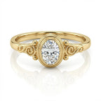Front view of 2 carat oval lab diamond ring in yellow gold bezel setting with swirl accents.