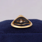 Inside band view displaying polished inner surface and light ports of 3-stone oval lab diamond ring.