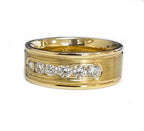 Angled view showing the brushed gold texture and brilliant round cut lab-grown diamonds in a channel setting.
