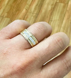 On-hand wear sample showing a wide yellow gold band with 6 channel-set lab diamonds on a finger.