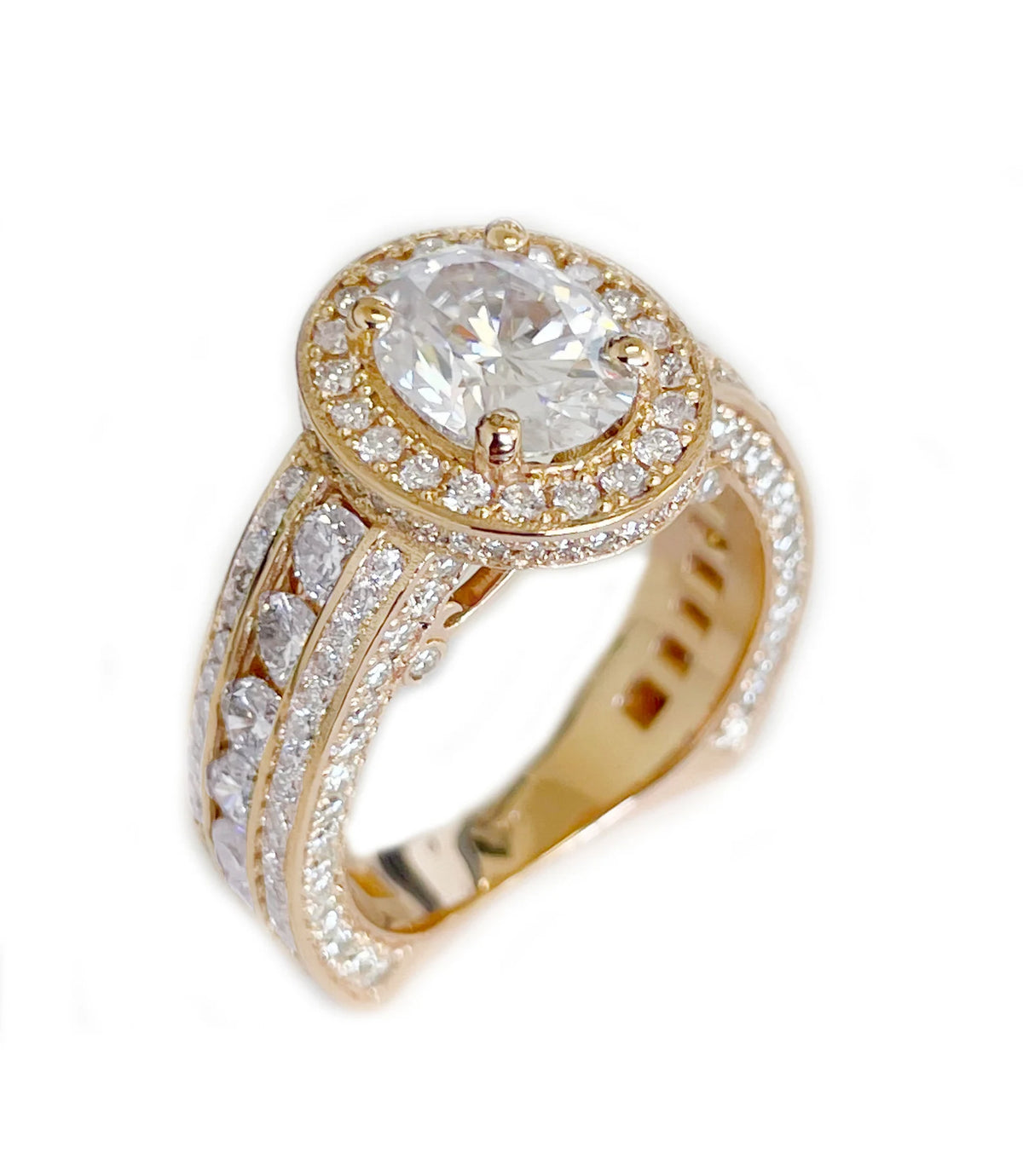 Perspective view showing the wide diamond-encrusted band and curved profile of an oval lab-grown diamond ring.
