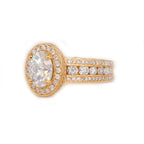 Close-up front perspective of a 2 CT oval lab diamond ring highlighting maximum sparkle across the triple-row band.