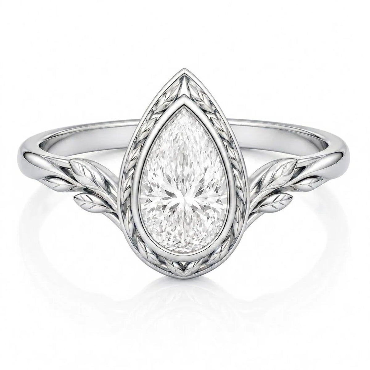 Front view of a 3 CT pear cut lab grown diamond ring with leaf engraved bezel in white gold.