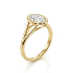 Upward side profile of a 3 CT oval cut lab grown diamond ring showcasing the V-split shank yellow gold band.