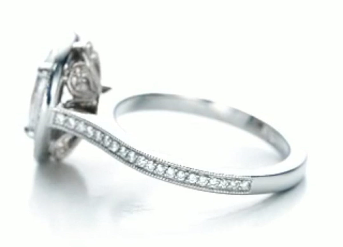 Side profile of the white gold band displaying the single-row milgrain pavé diamond setting.