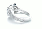 Close-up of the vintage hand-engraved scrollwork pattern along the outer lower band of the ring.