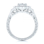 Studio elevation profile showing open filigree arches and fully hand-engraved ring band.