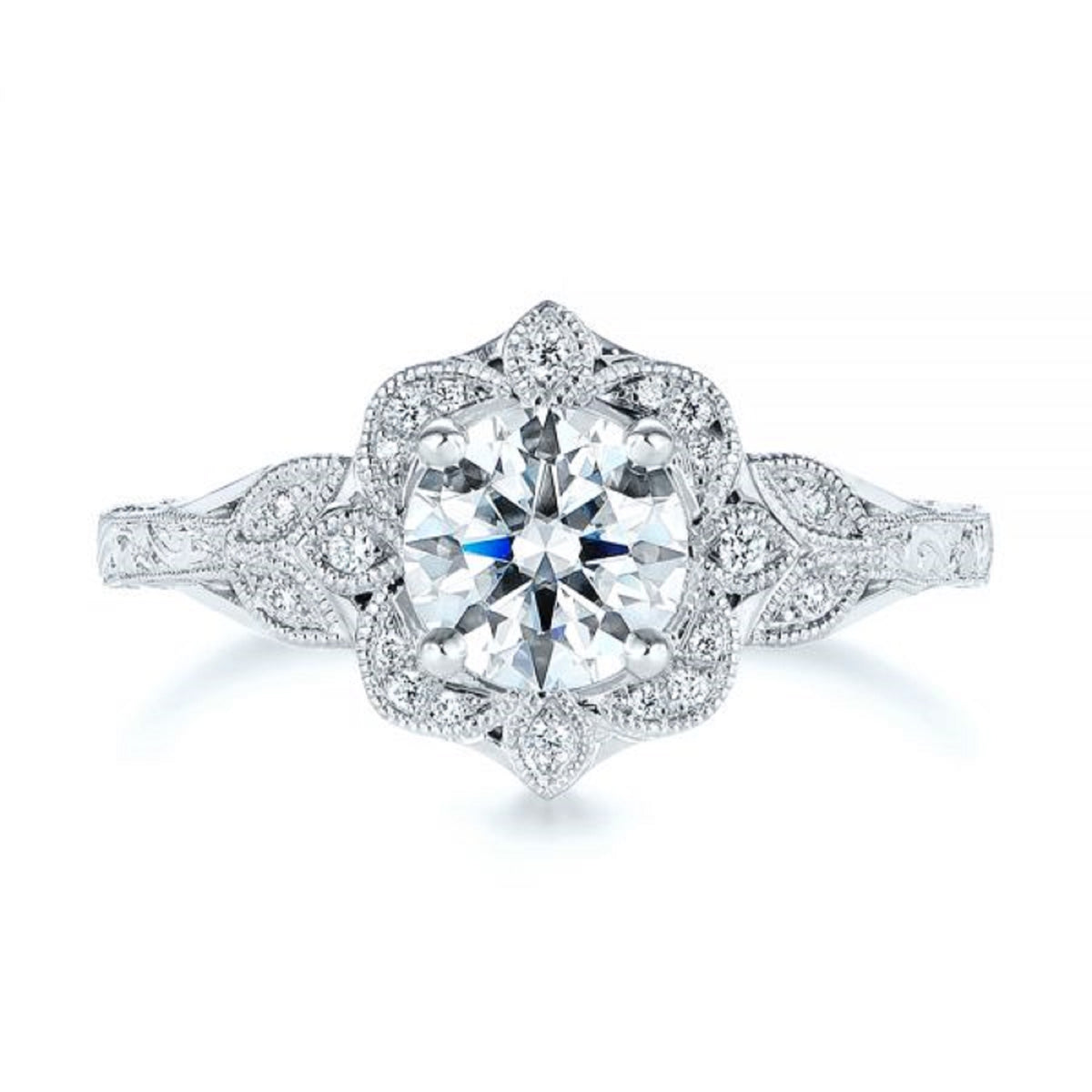 Clean studio top-down view of a 3 CT round brilliant lab diamond in a floral halo setting with leaf shoulders.