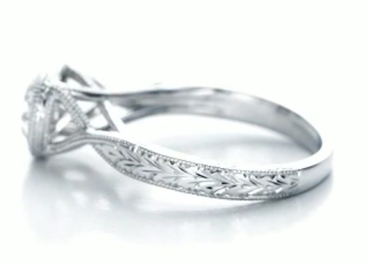 Alternate side view showing hand-carved wheat details tapering down the band.
