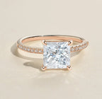 Front angled perspective showing the square princess cut lab diamond and rose gold micro-pavé set band.
