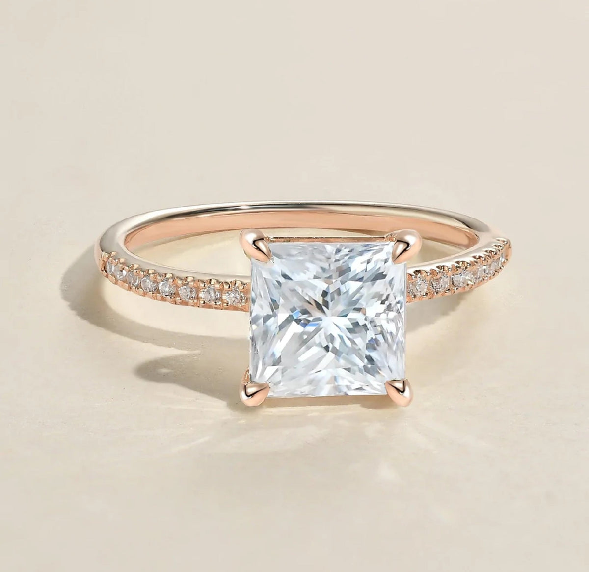 Front angled perspective showing the square princess cut lab diamond and rose gold micro-pavé set band.