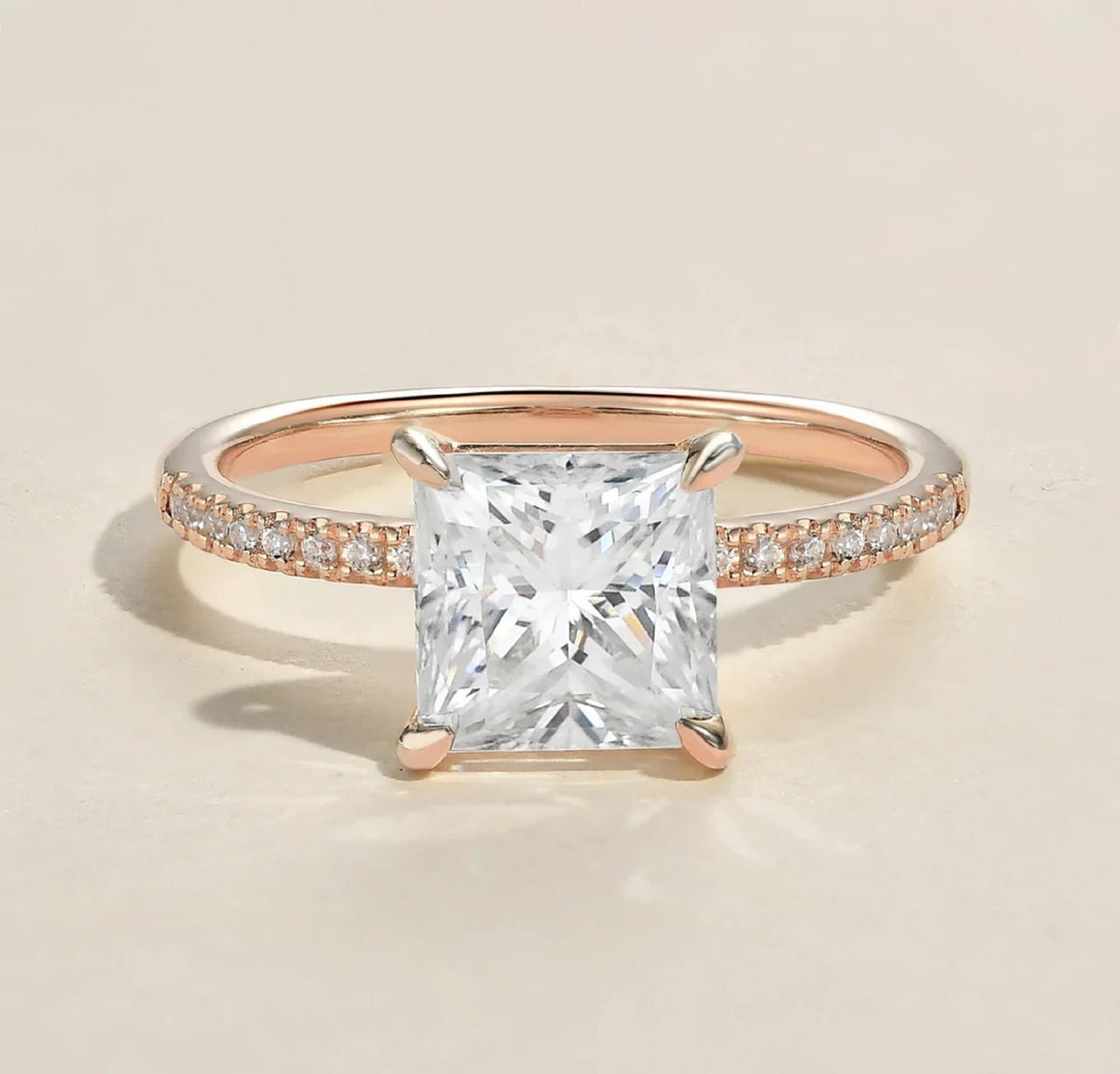 Direct front view showcasing the brilliance and facet structure of a 2ct square princess cut lab diamond in rose gold.