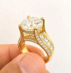 Profile view revealing the micro-pavé prongs and hidden halo underneath a 3 carat round lab grown diamond.