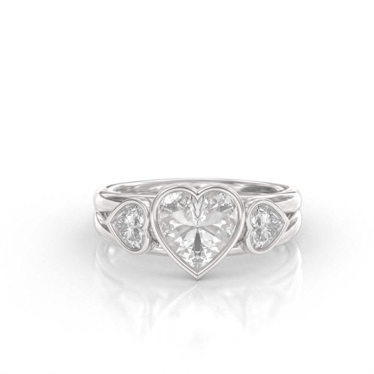Front view of a 2 carat heart-cut lab-grown diamond engagement ring with matching heart side stones set in 14K white gold bezel.